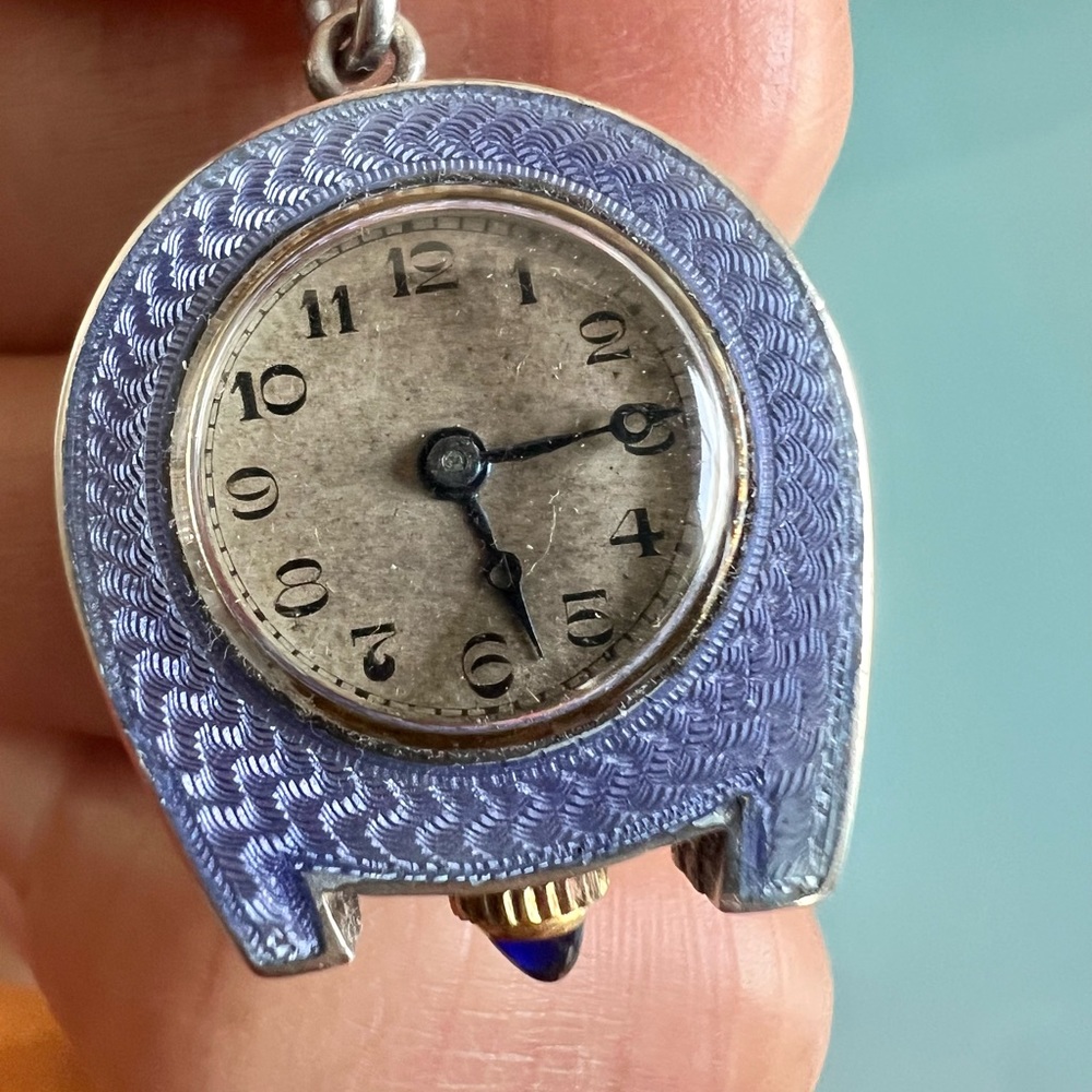 Vintage enamel silver  winding Watch, with 24” silver chain.